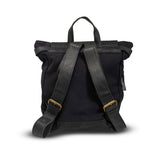 Black backpack with straps on a white background