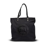 Black tote bag with a circular logo on a white background