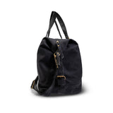 Black backpack with gold zippers on a white background