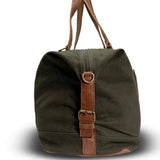 Green duffel bag with brown leather straps on a white background