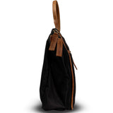 Black handbag with a brown handle on a white background