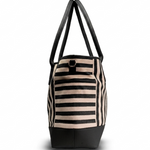 A striped tote bag with black leather-like handles and a black base, featuring alternating beige and black horizontal stripes on the body, shown against a plain white background.