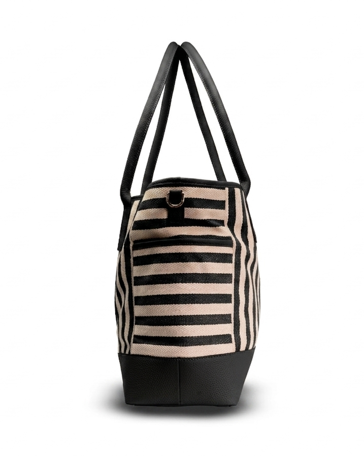 A striped tote bag with black leather-like handles and a black base, featuring alternating beige and black horizontal stripes on the body, shown against a plain white background.
